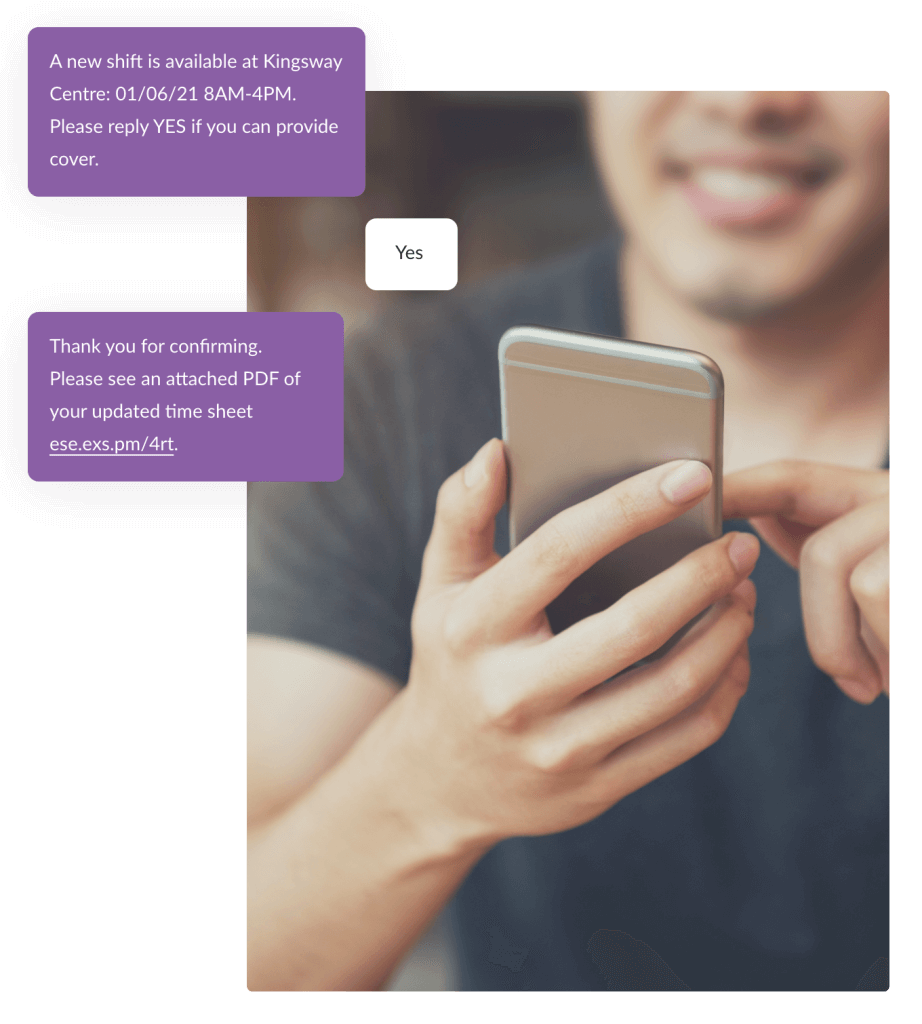 Photo of someone holding mobile in their hand with message bubbles notifying recipient that there is a shift available